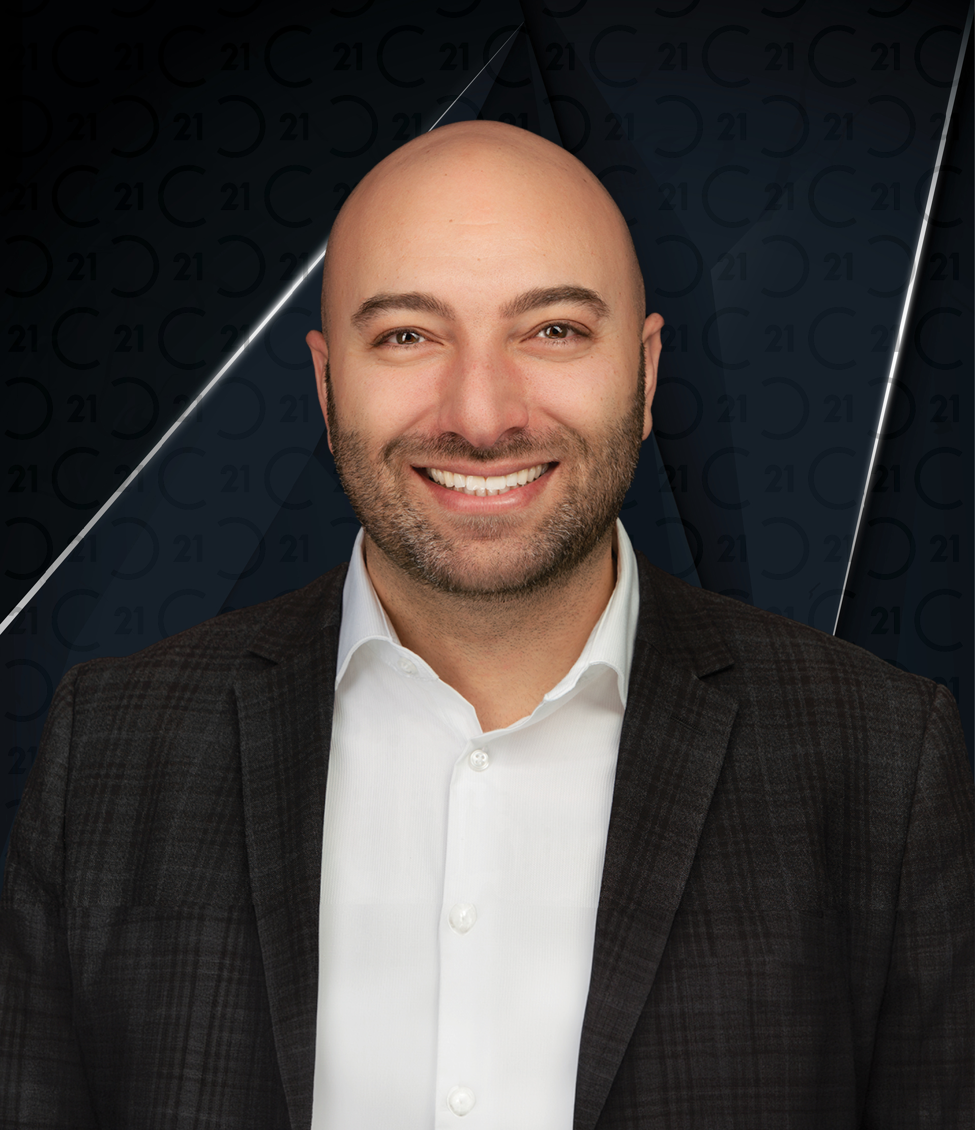 Professional headshot of dean soufan with modern background